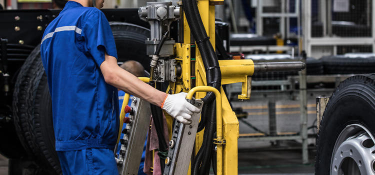 Service technician working on a truck